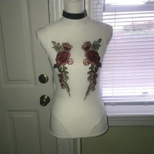 Body suit with flowers detail/ price firm